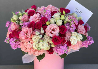 Round pink floral gift box, filled with fresh blooms, perfect for gifting in LA
