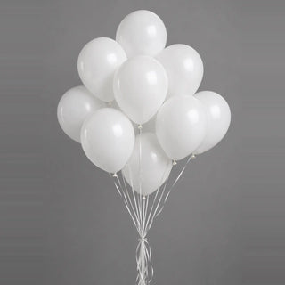 Bunch of round white helium balloons tied with white ribbons, against a plain gray background